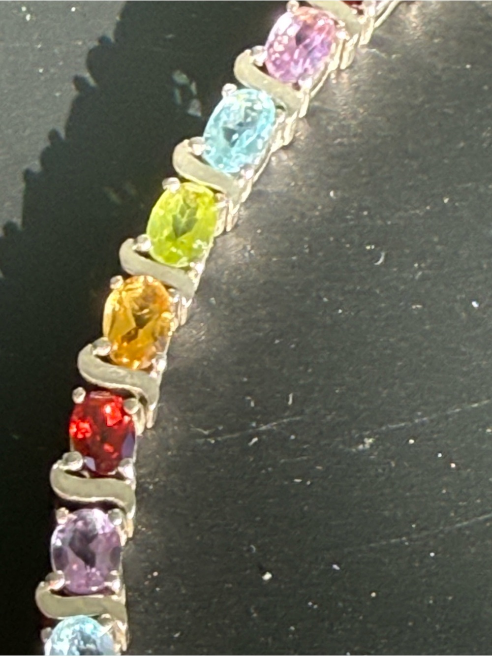 Sterling Silver 925  
Colorful multi color gem stone bracelet.
